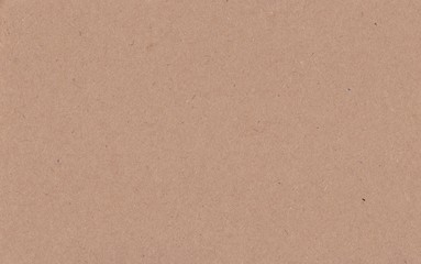 Obraz premium Texture cardboard made from waste paper, gray brown color background