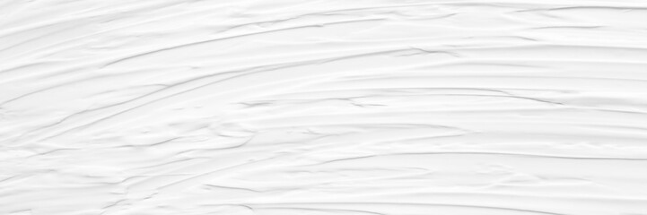 Obraz premium Cream texture for skin nourishment for good skin health Lotion Cosmetics Full frame Background Abstract texture Longitudinal Panorama High resolution.