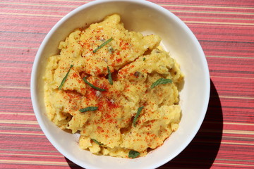 Jhunka or Zunka or pithale, a chickpea flour porridge, a vegetarian traditional Indian dish prepared in Maharashtra, Goa and Karnataka part of India