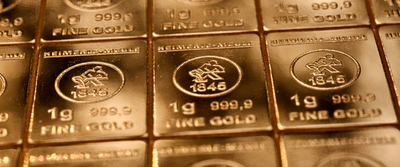 Close-up of a table of 1-gram pieces of 999 pure fine gold,