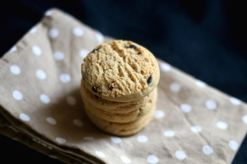 Stack of chocolate chip cookies. Selective focus. 