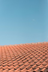 red tile roof and sky
