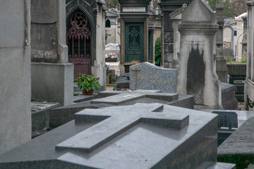 Fototapeta na wymiar Père Lachaise Cemetery Paris France. Graveyard with thombstones.