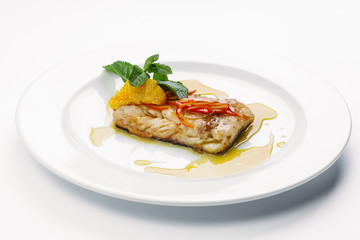 fish on a white plate