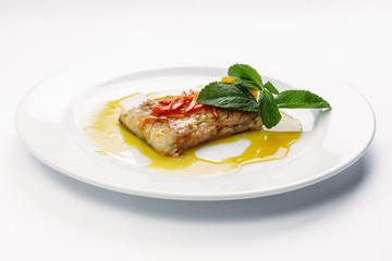fish on a white plate