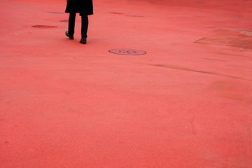 Fussgänger auf rotem Grund, St. Gallen, Schweiz