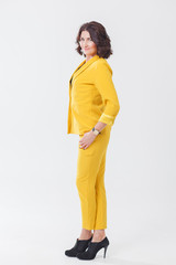 woman in yellow suit alone