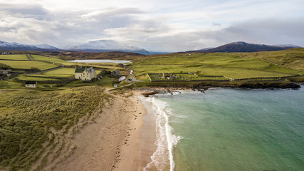 Aerial view on the old cemetery with sandy beach