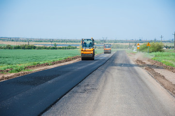 Fototapeta na wymiar Workers on a road construction