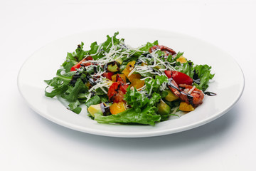 green salad on a white plate