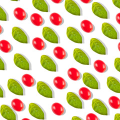 Pattern with tomato cherry and basil leaves on a white background