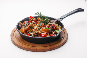 frying on a pan and a white background
