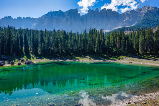 Lago di Carezza below Latemar mountain range, South Tyrol, Italy