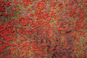 Rust red spots on old weathered metal surface