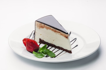 Delicious slice of Torat on a white background