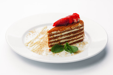 Delicious slice of Torat on a white background