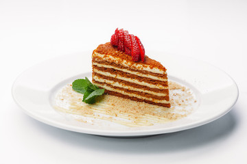 Delicious slice of Torat on a white background