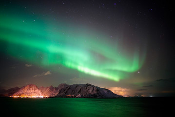 Fototapeta na wymiar The Northern Lights over Lofoten sky, Norway