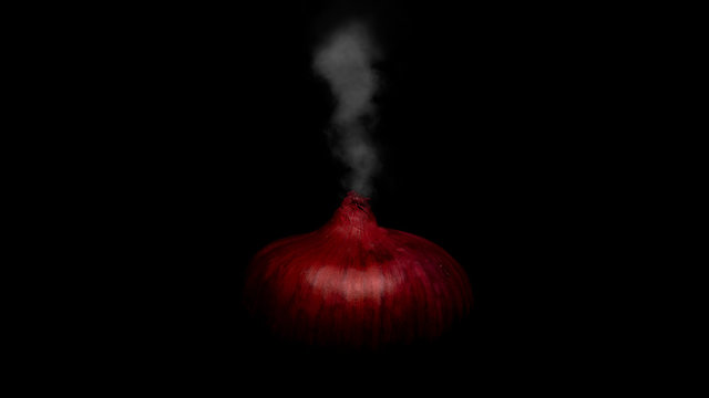 Smoking red onion on black