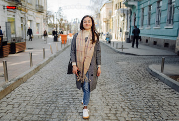 Woman portrait walking in the street