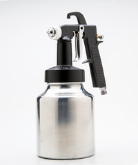 A spray gun on a white background