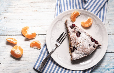 Cherry cake homemade with orange slices