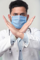 Male Doctor wearing Surgical Mask. epidemic corona virus outbreak concept