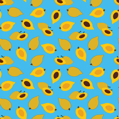 yellow canistel, lucuma or egg fruit with seeds seamless pattern on turquoise blue background.