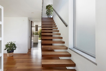 Apartment entrance hall with wooden staircase access to upper floor, design, furniture, home,...