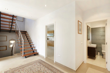 Apartment entrance hall with wooden staircase access to upper floor, design, furniture, home, modern, sea, wooden
