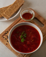 Vegan red soup in white plate