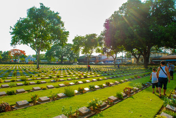 KANCHANABURI, THAILAND - April 1, 2019 : Kanchanaburi War Cemetery (Don Rak) cemetery for victims of Japanese imprisonment while building the Burma Railway