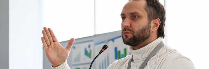 Man speaking about financial report