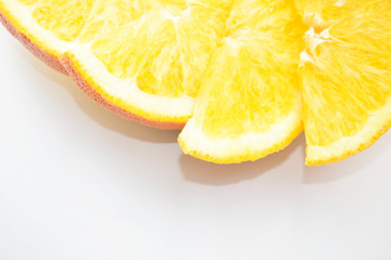 Fresh juicy sliced orange slices on a white background.