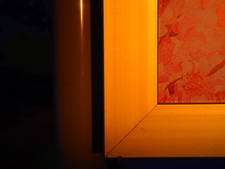 closeup sunset light on the bill board aluminum frame