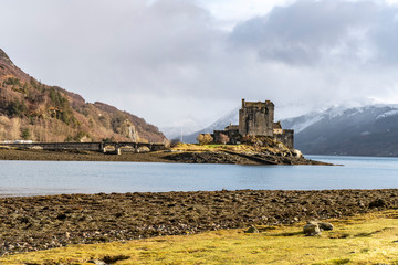 Old castle at the edge of lake