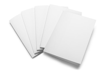 Folded sheets of white paper, isolated on white background