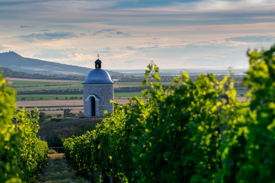 Stone chapel Hradistek on a hill among vineyards overlooking Palava