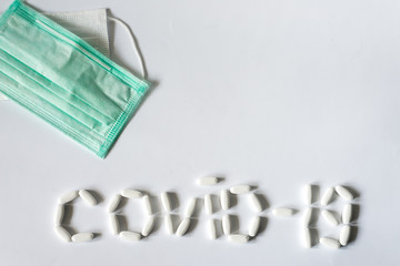  Covid-19 medical disposable face mask The new coronavirus pneumonia received the official name from WHO: COVID-19. protective mask with ear loop self-isolation