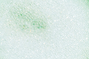 Green lather background, top view.