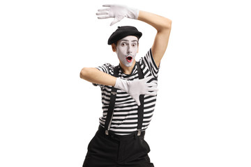 Mime artist gesturing with hands