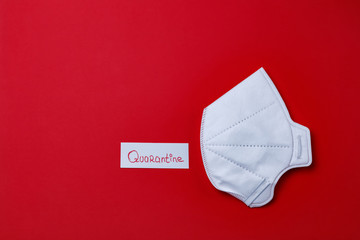 White protective mask on a red background