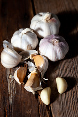 Garlic on a wooden background. Food on table.