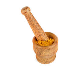 Cinnamon powder. Mortar and pestle isolated on white .