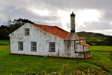 Fototapeta na wymiar Typical house architecture on pastures in the Azores