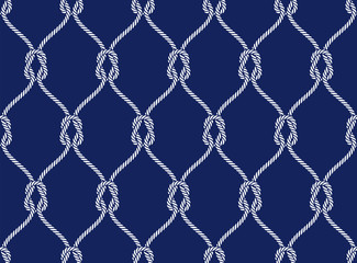 Fototapeta premium Vector rope, fishing net, seamless. Blue background.