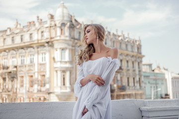 Modern bride in a beautiful white dress and long flowing hair.