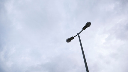 double street lamp on sky background
