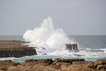 waves crashing on the rocks