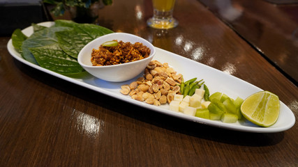 Mieng kham is a traditional snack from Thailand and Laos. The name miang kham.                     